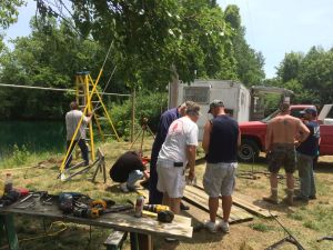 Sea Nags repairing picnic tables and installing a gear drying rack at Circleville Dive Center